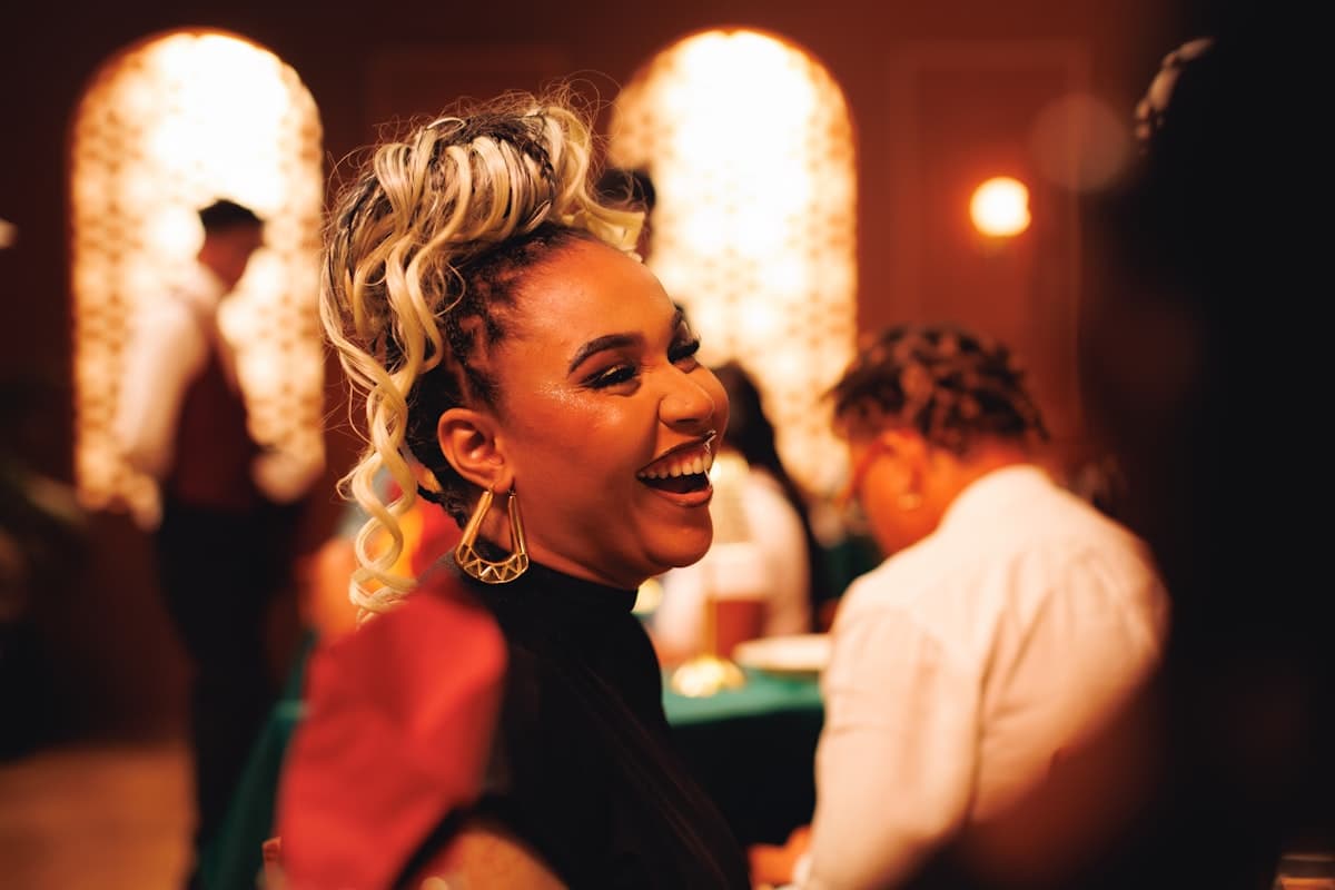 Guest laughing at a wedding reception
